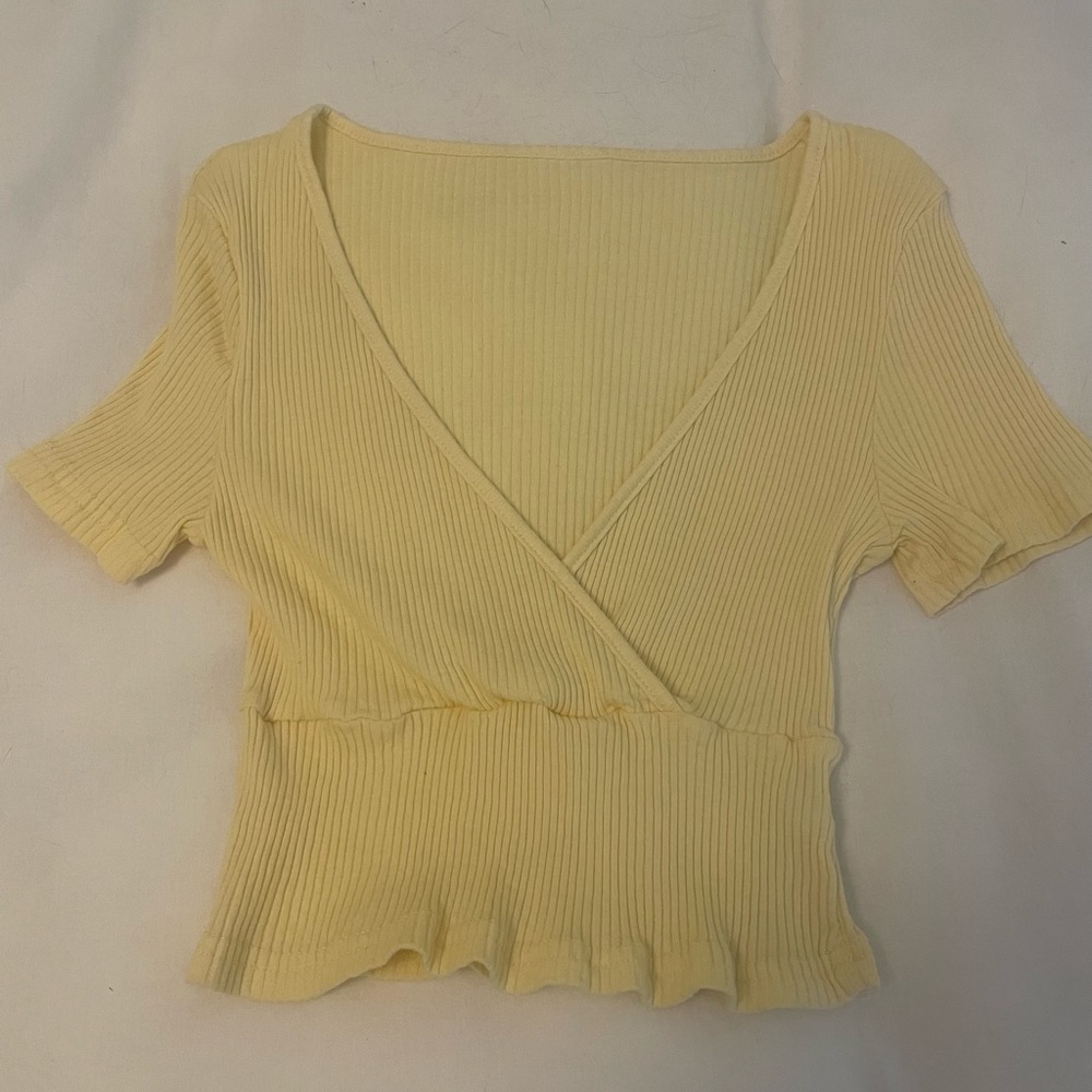 yellow cropped shirt